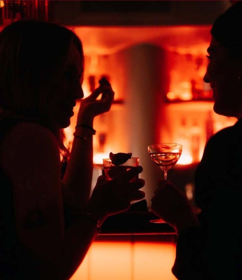 Guests enjoying drinks at The Meridian